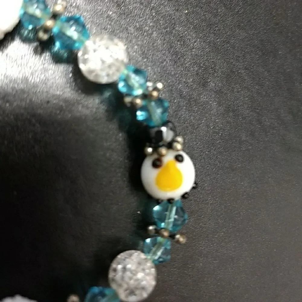 Silver tone and blue snowman bracelet 6.75